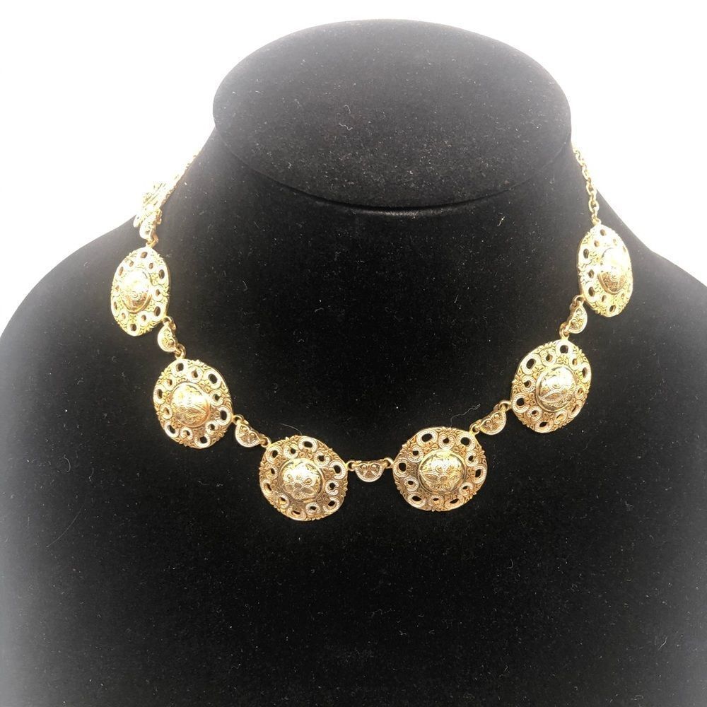 Gold Tone Medallion Connected to form a necklace
